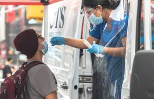 Covid-19 cases surge in Hong Kong and Singapore, health authorities on alert