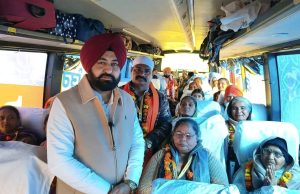 Revenue Minister flags off bus carrying devotees to Sri Amritsar Sahib
