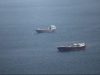 Iran reopens Strait of Hormuz; oil prices drop 10% amid easing tensions