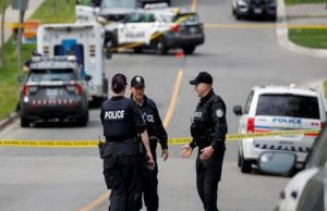 Military-clad gunman kills police officer, civilian in shooting near Montreal before being shot dead